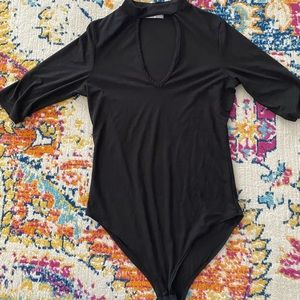 Women’s black bodysuit
